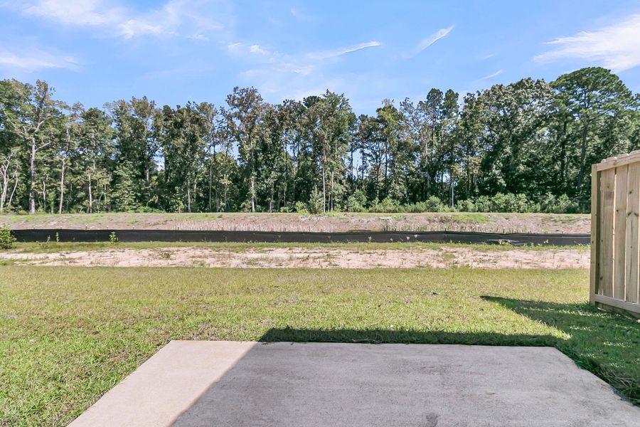 Front exterior of a new home in Abbey Walk, Moncks Corner, SC, highlighting curb appeal (Image 27).
