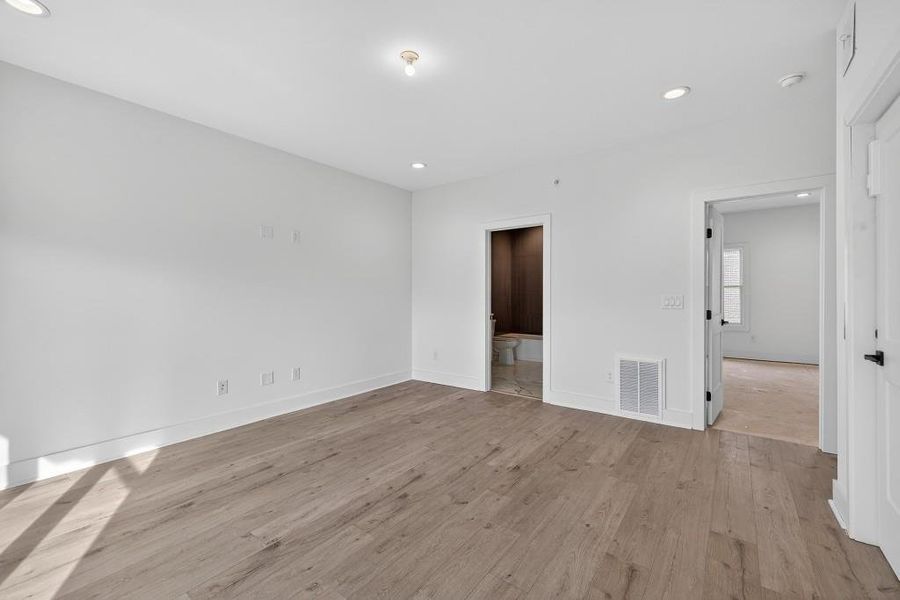 Spacious, unfurnished interior of a new home in Skyview On Broad, Sugar Hill (Image 23). Spacious, unfurnished interior of a new home in Skyview On Broad, Sugar Hill (Image 23).