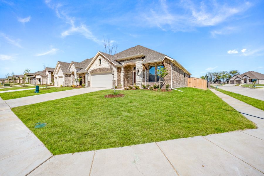 Front exterior of a new home in Summerwood, Red Oak, TX, highlighting curb appeal (Image 21).