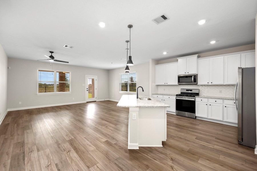 Furnished interior view inside a new home in Sunterra, Katy (Image 3).