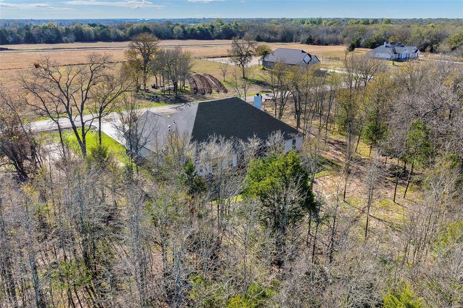 Impressive lot size and natural wooded buffer. Rare opportunity for peaceful country living with generous space and scenic beauty in every direction.