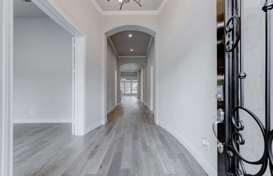 Representative unfurnished interior of a home built from the 3049 by Ravenna Homes in The Woodlands Hills 65′, Willis (Image 17). Representative unfurnished interior of a home built from the 3049 by Ravenna Homes in The Woodlands Hills 65′, Willis (Image 17).