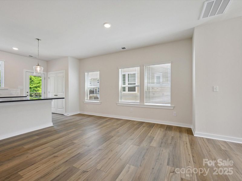 Spacious, unfurnished interior of a new home in Central Living at Craig, Charlotte (Image 29).