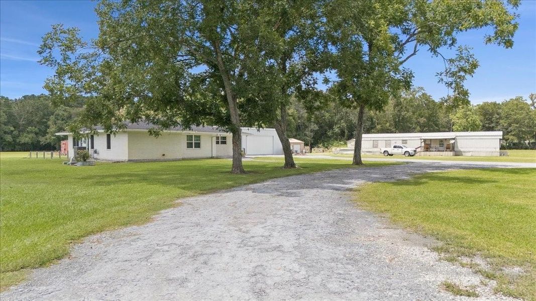 Front exterior of a new home in , Orange, TX, highlighting curb appeal (Image 18). Front exterior of a new home in , Orange, TX, highlighting curb appeal (Image 18).
