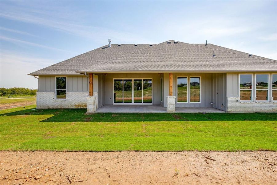 Front exterior of a new home in , Godley, TX, highlighting curb appeal (Image 25).