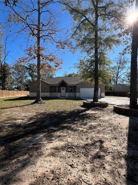 Front exterior of a new home in , Cleveland, TX, highlighting curb appeal (Image 26). Front exterior of a new home in , Cleveland, TX, highlighting curb appeal (Image 26).