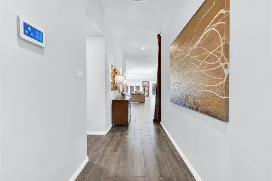 Furnished interior view inside a new home in Woodstone, Providence Village (Image 4). Furnished interior view inside a new home in Woodstone, Providence Village (Image 4).