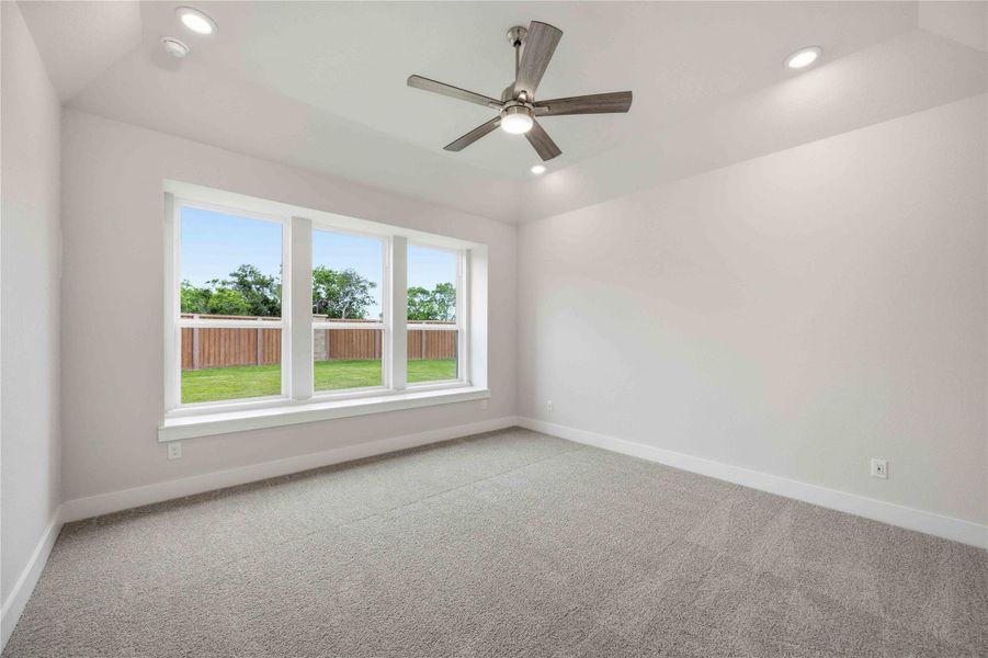 Spacious, unfurnished interior of a new home in Ellwood, Iowa Colony (Image 26).