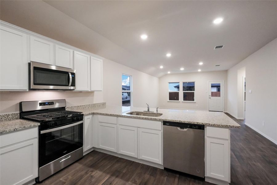 Furnished interior view inside a new home in Watermill, Uhland (Image 7).