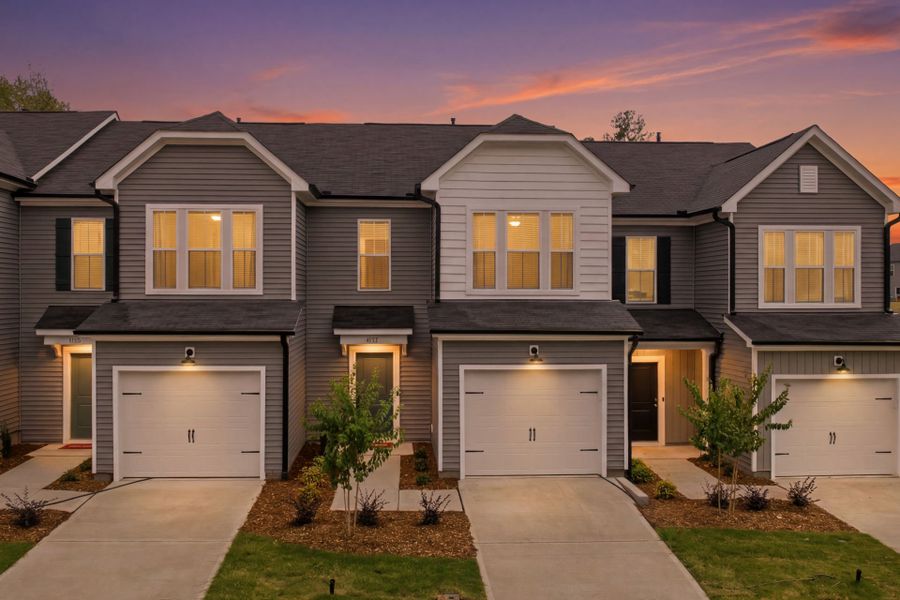 Front exterior of a new home in Carpenter Falls, Durham, NC, highlighting curb appeal (Image 2). Front exterior of a new home in Carpenter Falls, Durham, NC, highlighting curb appeal (Image 2).