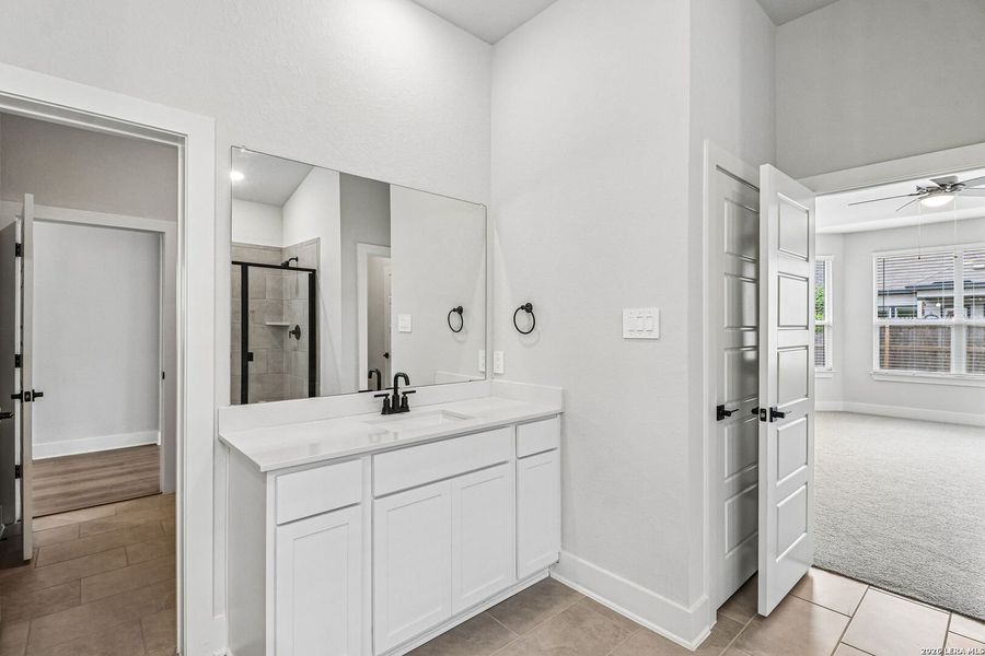 Furnished interior view inside a new home in Estancia Ranch - Classic Series, San Antonio (Image 13).