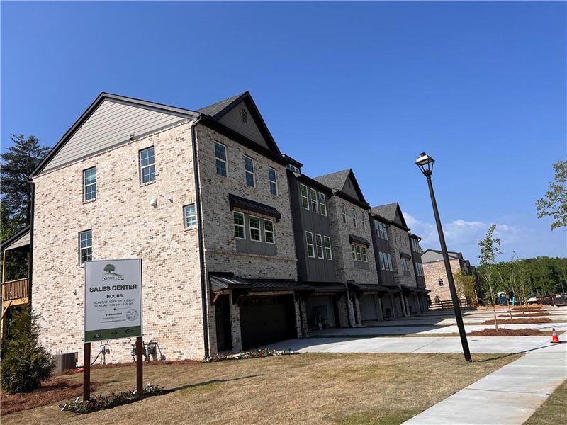 Front exterior of a new home in , Cumming, GA, highlighting curb appeal (Image 17).