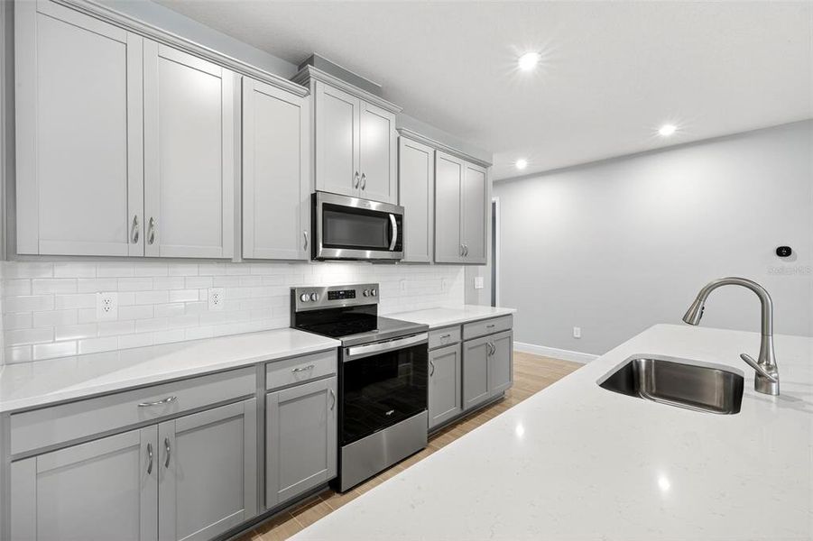 Furnished interior view inside a new home in Windwater, Parrish (Image 11).