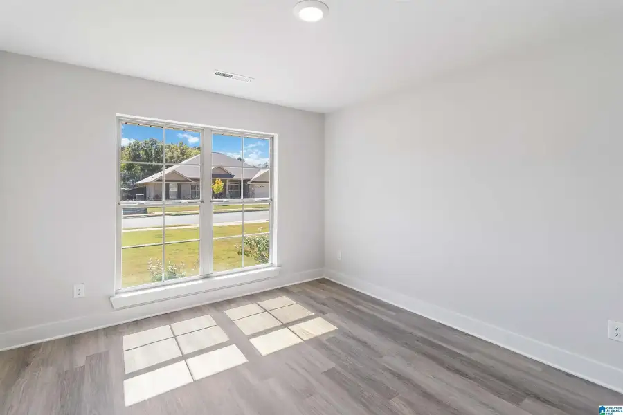 Representative unfurnished interior of a home built from the 3000 by Adams Homes in Flagler Estates, Hastings (Image 27).
