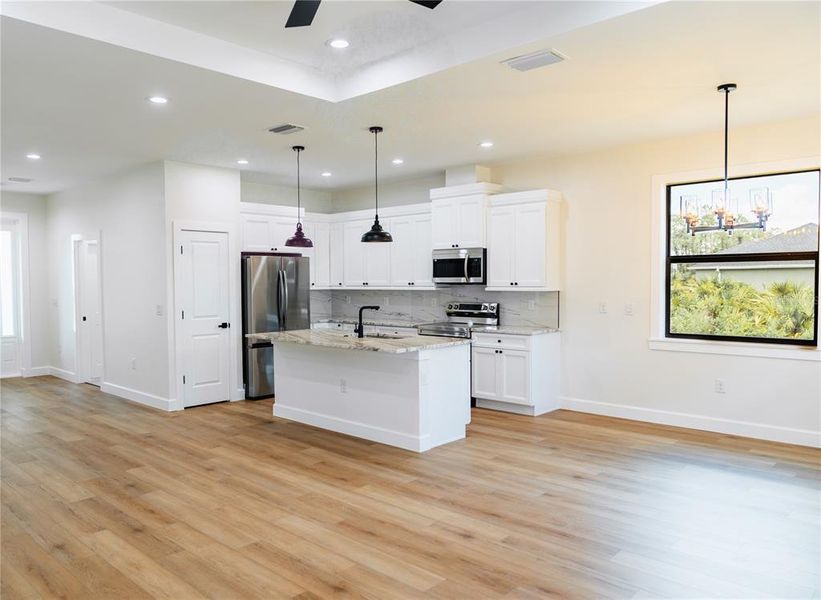 Furnished interior view inside a new home in , North Port (Image 11).