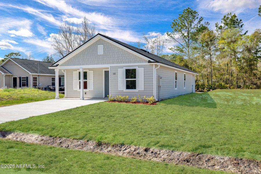 Front exterior of a new home in , East Palatka, FL, highlighting curb appeal (Image 18). Front exterior of a new home in , East Palatka, FL, highlighting curb appeal (Image 18).