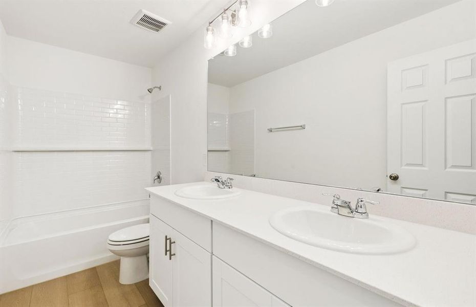 Spacious secondary bathroom with double vanity