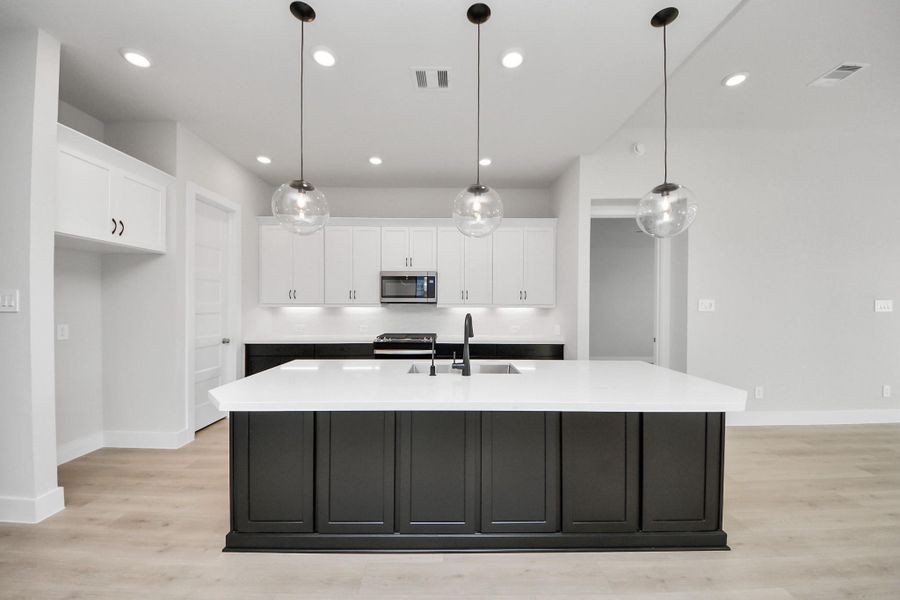 Furnished interior view inside a new home in Elyson, Katy (Image 9).