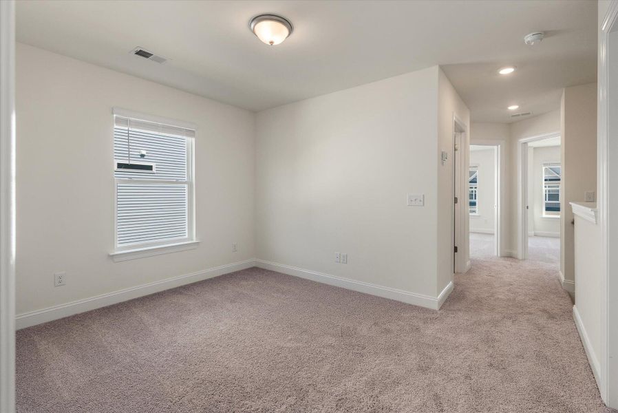 Spacious, unfurnished interior of a new home in The Landings at Montague, Goose Creek (Image 30).