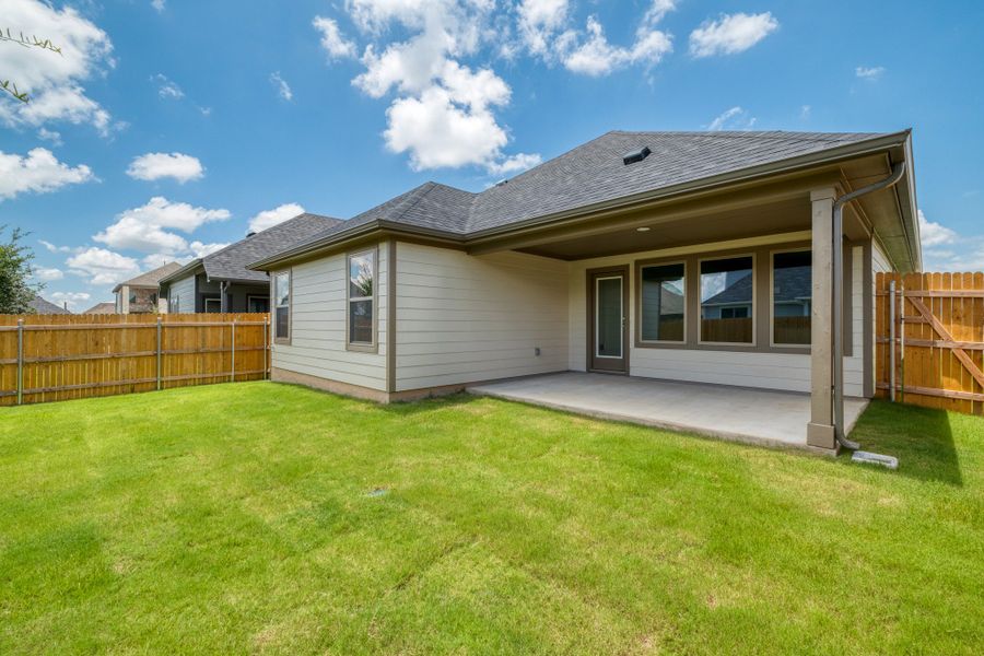 Exterior details and patio area of a home in Prairie Winds, Hutto (Image 4).