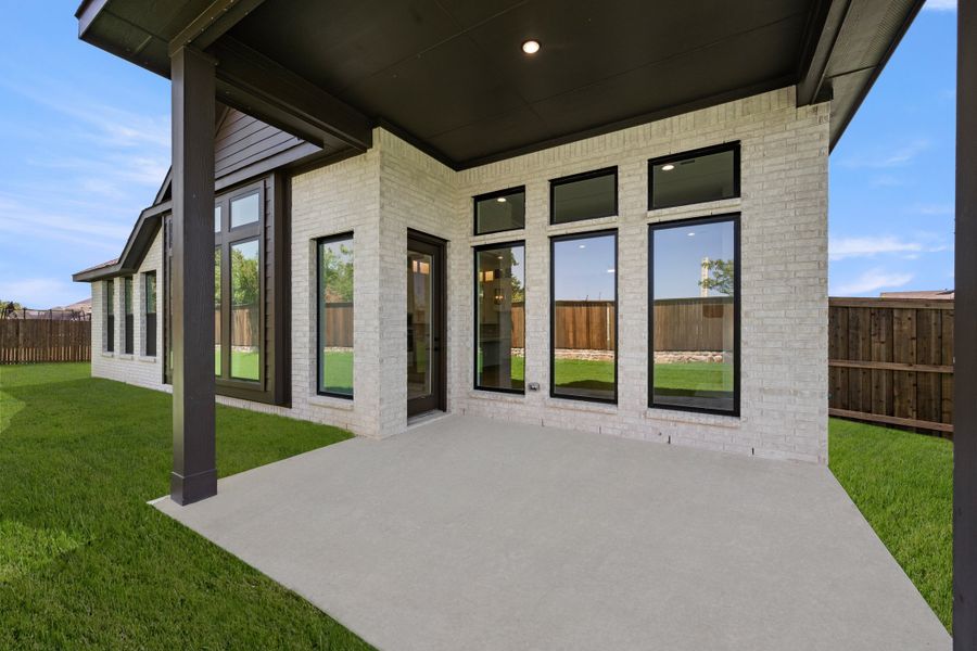 Exterior details and patio area of a home in Redden Farms, Midlothian (Image 20).