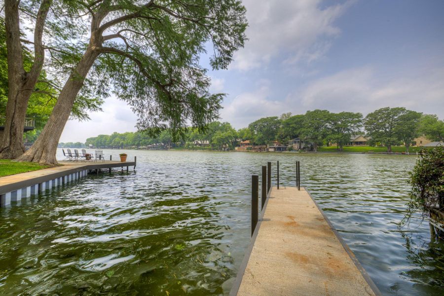Lake Ridge subdivision private concrete dock extending into the water