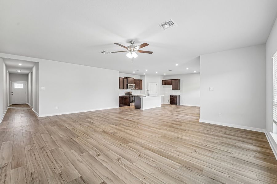 Representative unfurnished interior of a home built from the Warrior by Omega Builders in Grove East, Temple (Image 9).