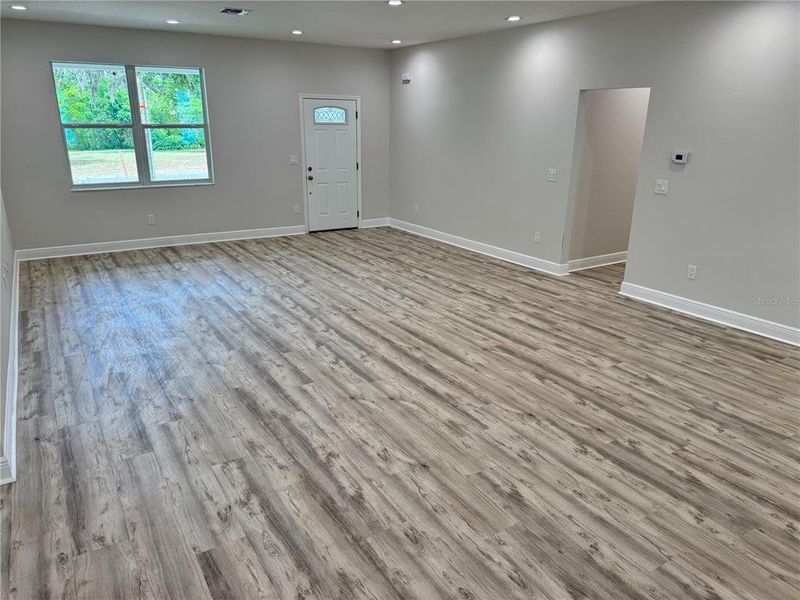 Spacious, unfurnished interior of a new home in , Dade City (Image 38).