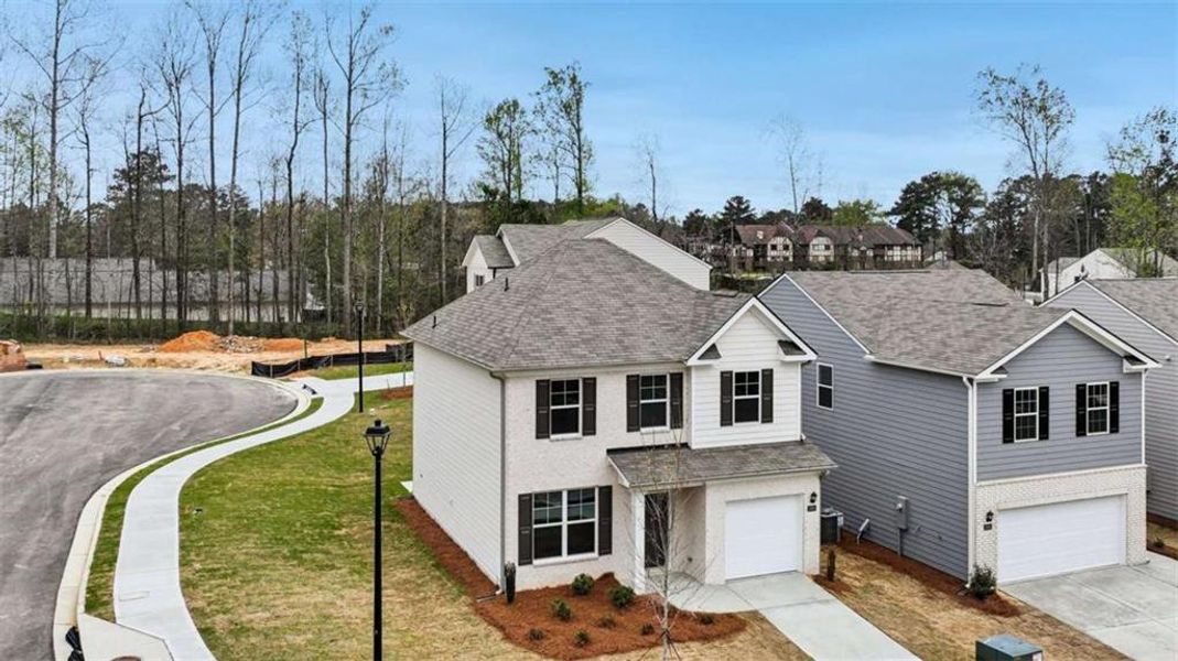 Front exterior of a new home in Sherwood Manor, College Park, GA, highlighting curb appeal (Image 21).