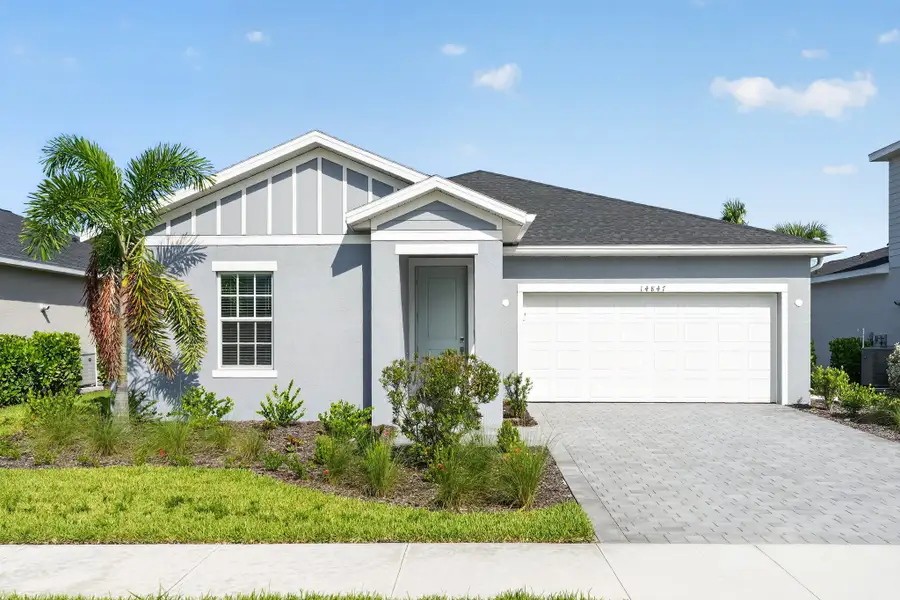 Front exterior of a new home in Tuckers Cove at Babcock Ranch, Punta Gorda, FL, highlighting curb appeal (Image 1). Front exterior of a new home in Tuckers Cove at Babcock Ranch, Punta Gorda, FL, highlighting curb appeal (Image 1).