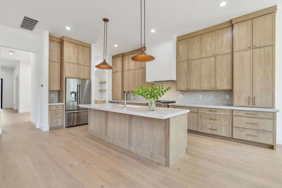 Featuring custom white oak cabinetry.