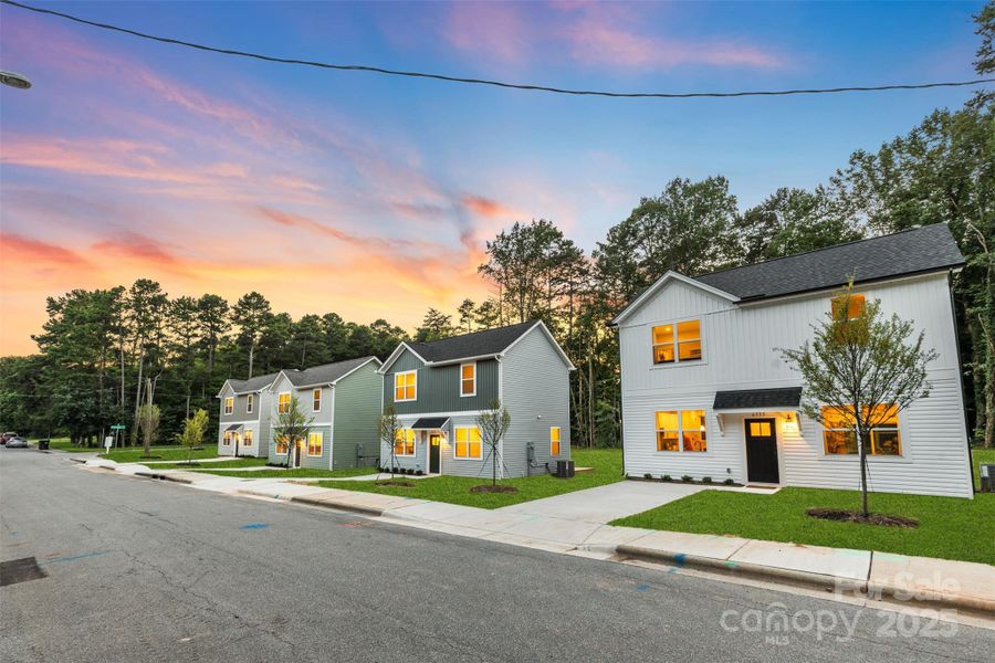 Front exterior of a new home in , Charlotte, NC, highlighting curb appeal (Image 23).