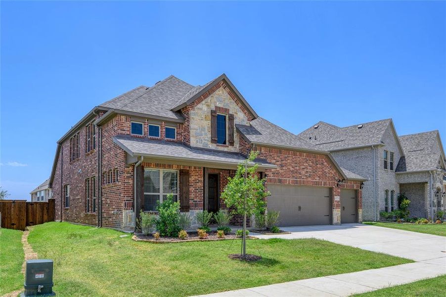 Front exterior of a new home in Creekview Meadows, Pilot Point, TX, highlighting curb appeal (Image 17). Front exterior of a new home in Creekview Meadows, Pilot Point, TX, highlighting curb appeal (Image 17).
