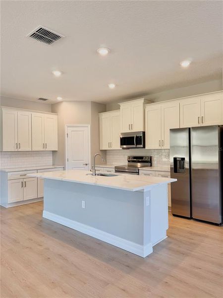Furnished interior view inside a new home in , Center Hill (Image 4). Furnished interior view inside a new home in , Center Hill (Image 4).