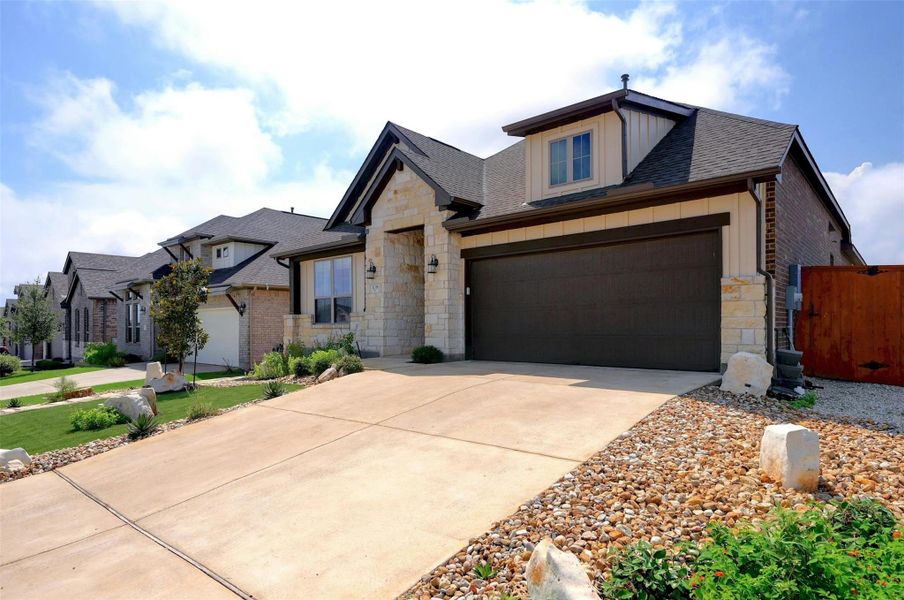 Front exterior of a new home in , San Marcos, TX, highlighting curb appeal (Image 23).