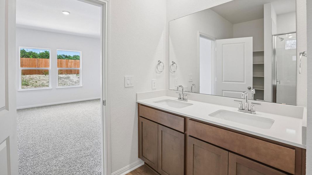 Furnished interior view inside a new home in Bar W Ranch, Leander (Image 11).