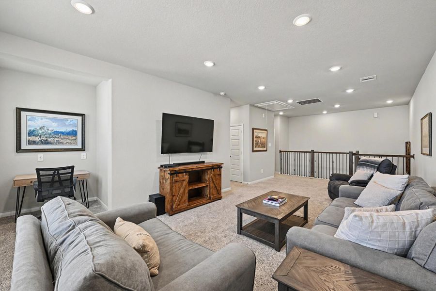 The spacious upstairs game room includes a versatile study nook that can easily adapt to your needs. The spacious upstairs game room includes a versatile study nook that can easily adapt to your needs.