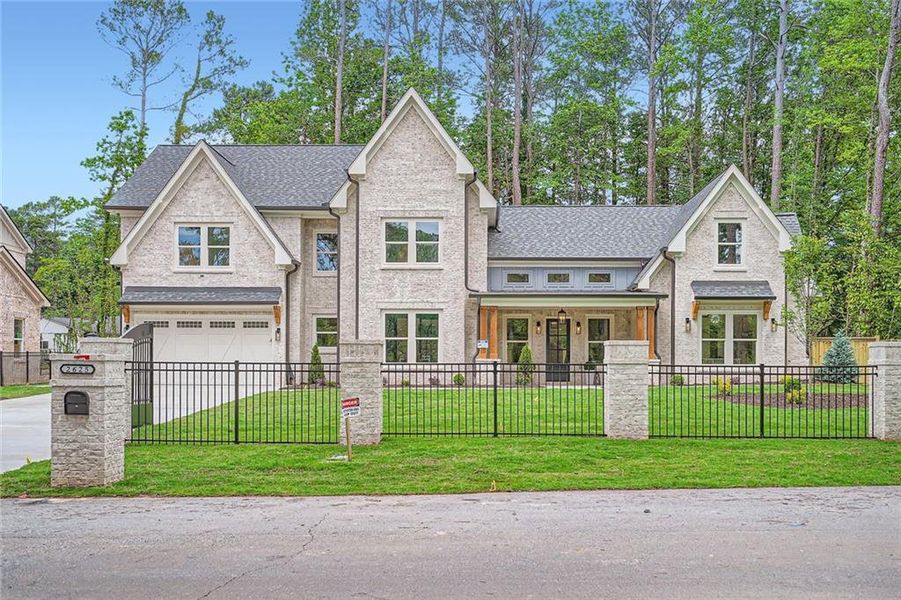 Front exterior of a new home in , Snellville, GA, highlighting curb appeal (Image 23).