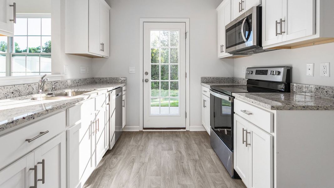 Furnished interior view inside a new home in Henley Ridge, Graham (Image 8).
