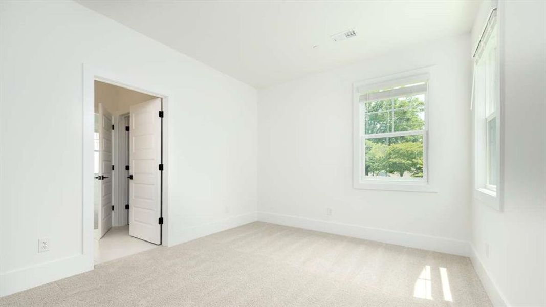 Spacious, unfurnished interior of a new home in The Village at Sandy Plains, Marietta (Image 11).