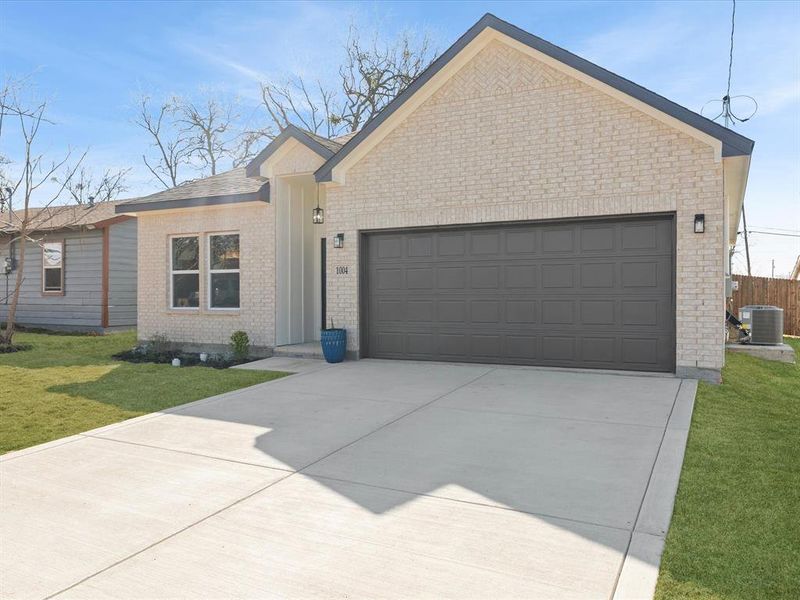 Front exterior of a new home in , Kaufman, TX, highlighting curb appeal (Image 24).
