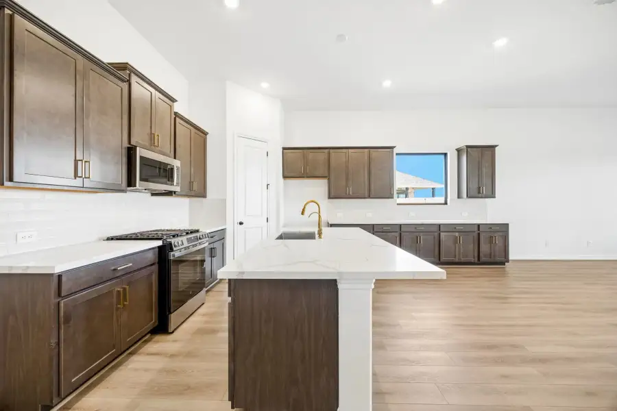 Kitchen. Sample product photo. Actual exterior and interior selections may vary by homesite. Photo may be virtually staged.