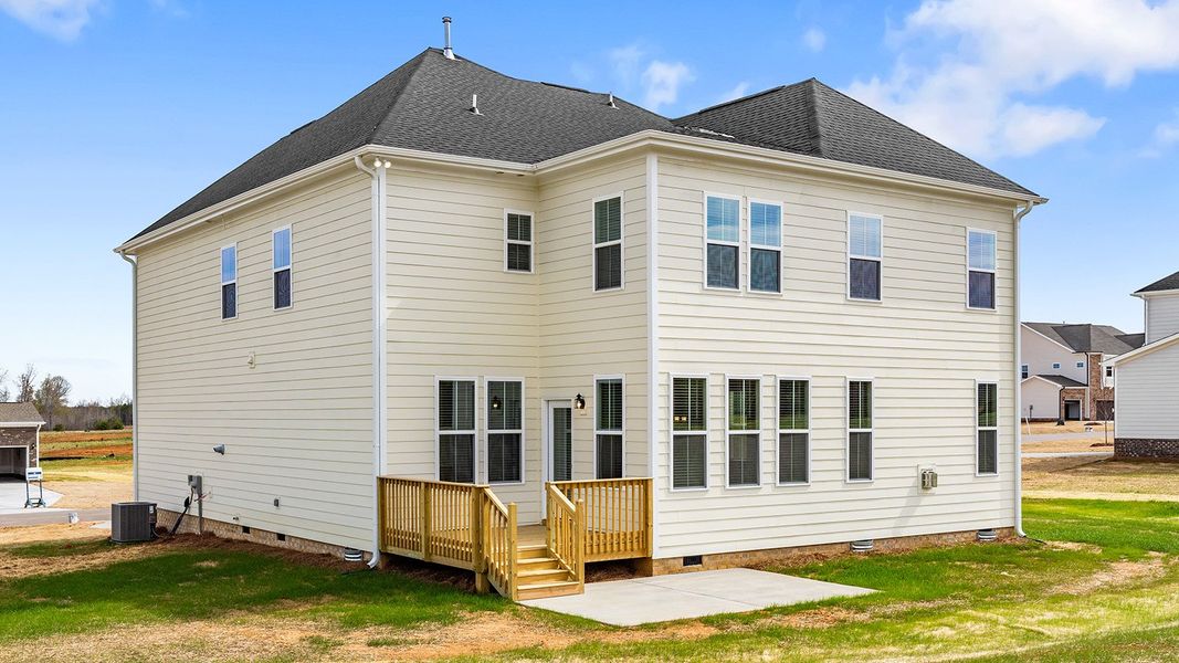 Exterior details and patio area of a home in Lilah Grove, Summerfield (Image 22).