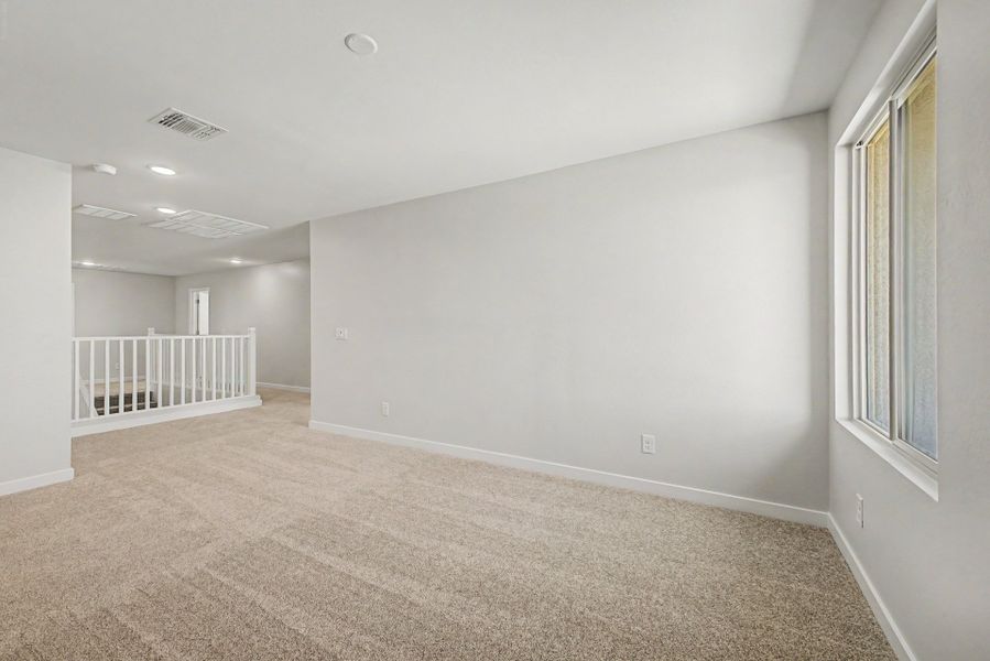 Spacious, unfurnished interior of a new home in Wildera, San Tan Valley (Image 9).