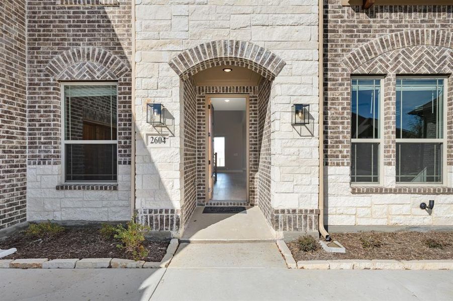 Exterior details and patio area of a home in Parks at Panchasarp Farms 55-60, Burleson (Image 3).