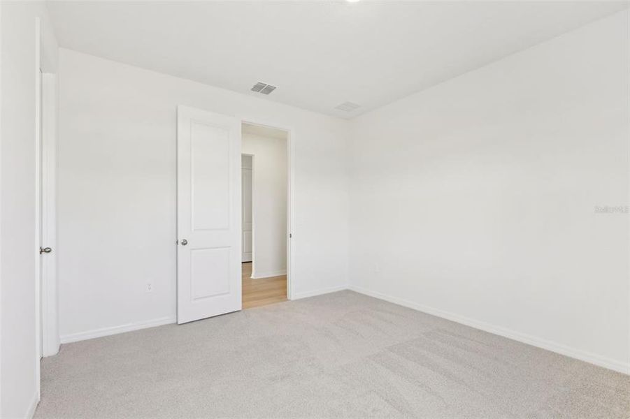 Spacious, unfurnished interior of a new home in Coasterra - Reserve Series, Palmetto (Image 40).