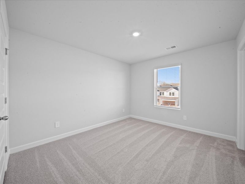 Spacious, unfurnished interior of a new home in The Farm at Wells Creek - Signature Collection, Gray Court (Image 16).