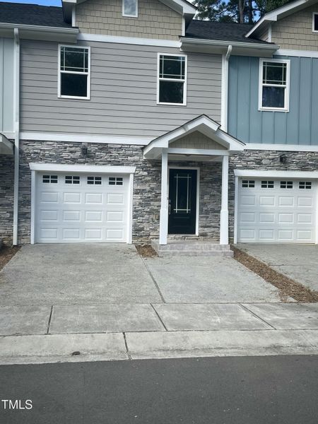 5502 Batoul Lane front door/garage view