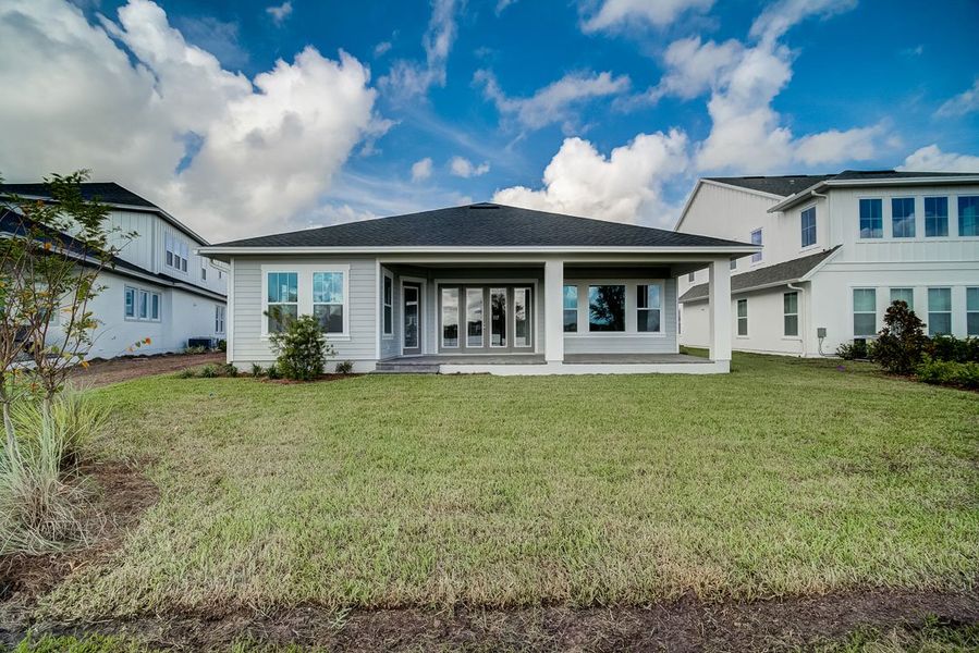 Representative exterior details of a home built from the The Shalimar by David Weekley Homes in Laureate Park at Lake Nona - Park Series, Orlando (Image 4). Representative exterior details of a home built from the The Shalimar by David Weekley Homes in Laureate Park at Lake Nona - Park Series, Orlando (Image 4).