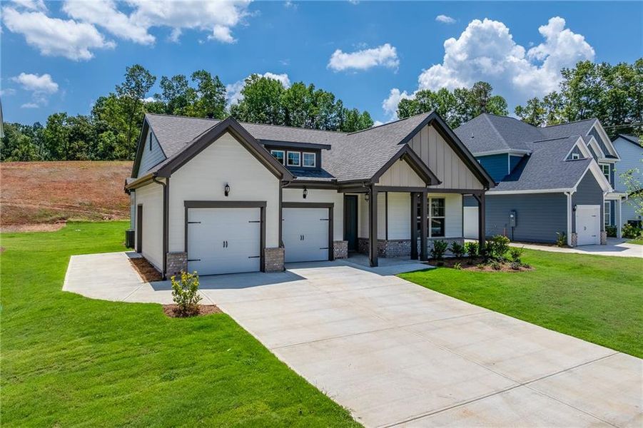 Front exterior of a new home in , Homer, GA, highlighting curb appeal (Image 17). Front exterior of a new home in , Homer, GA, highlighting curb appeal (Image 17).